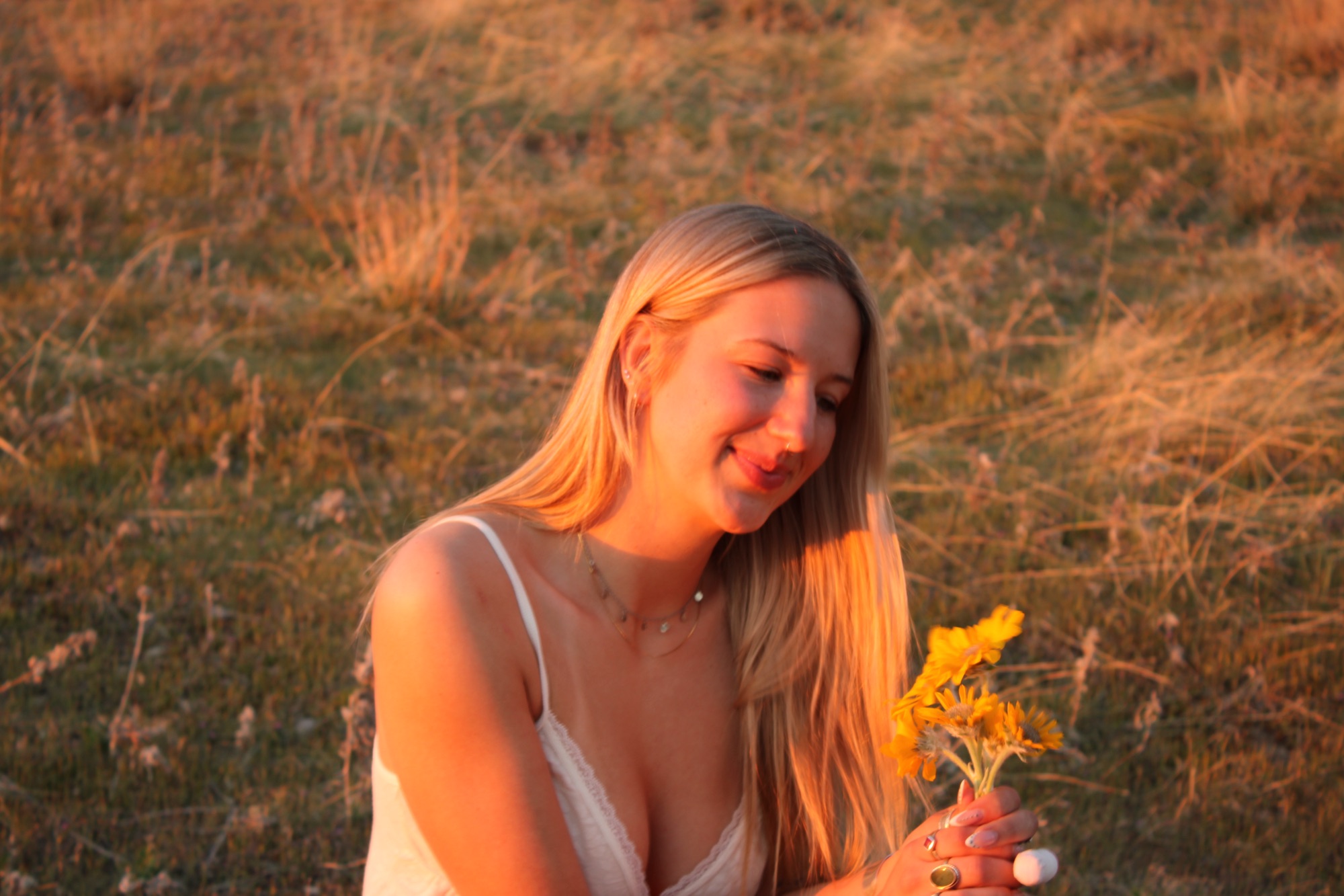 Golden hour portrait in field
